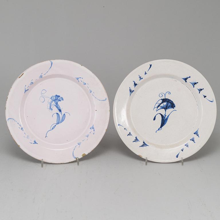 A set of four 18th Century faience dishes, one marked Marieberg.