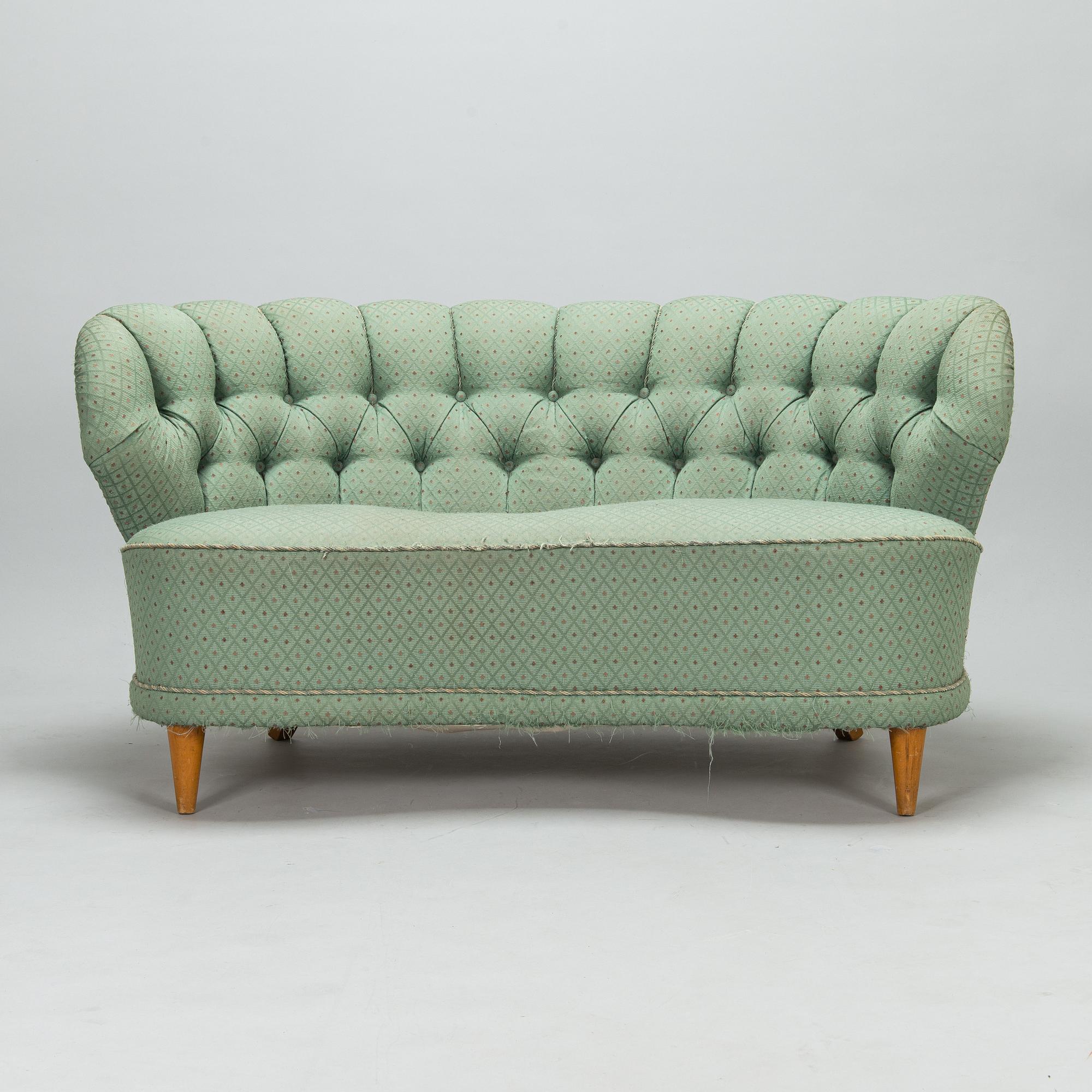 A mid-20th-century sofa.