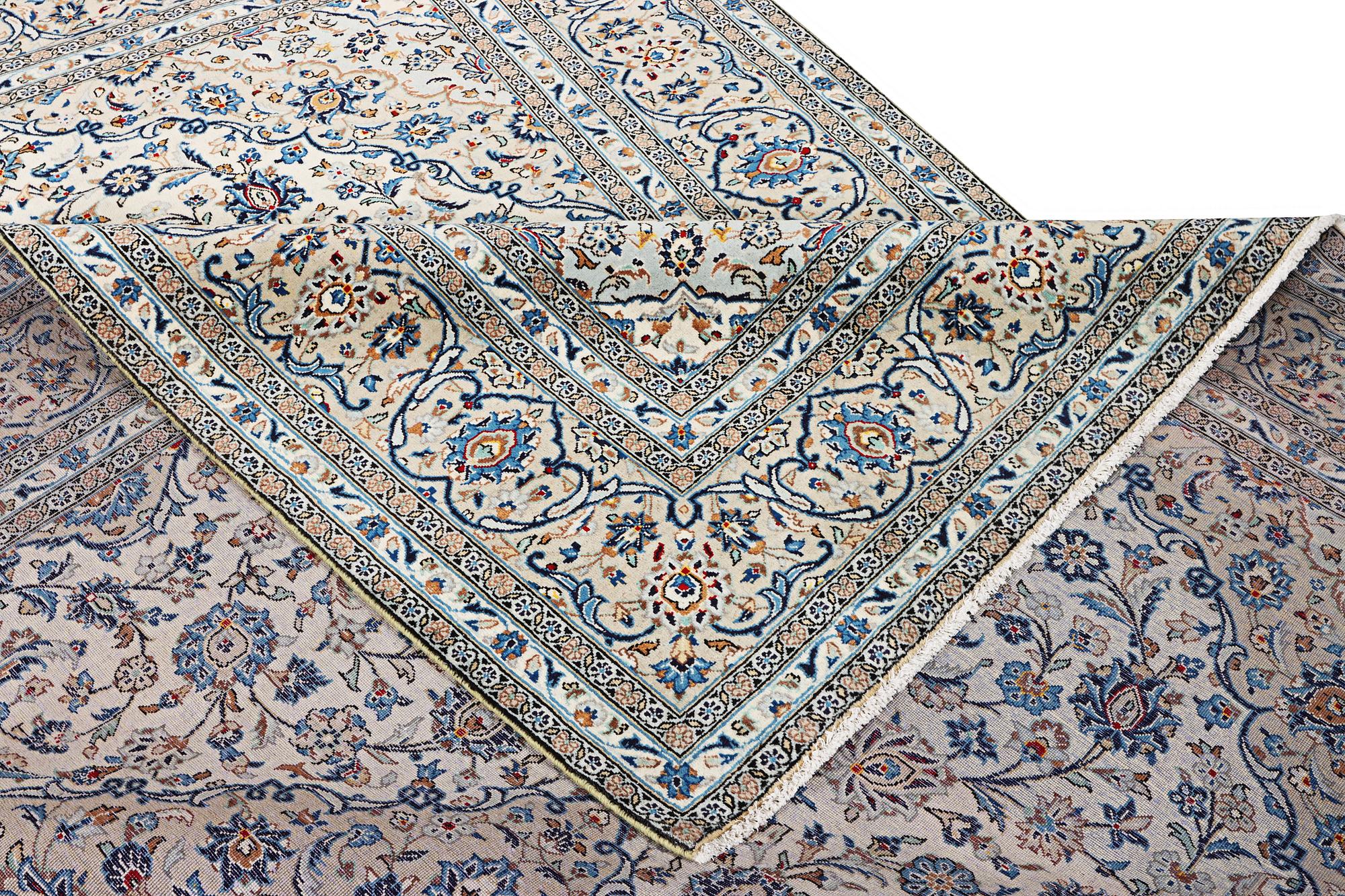 A Kashan carpet, c. 355 x 238 cm.