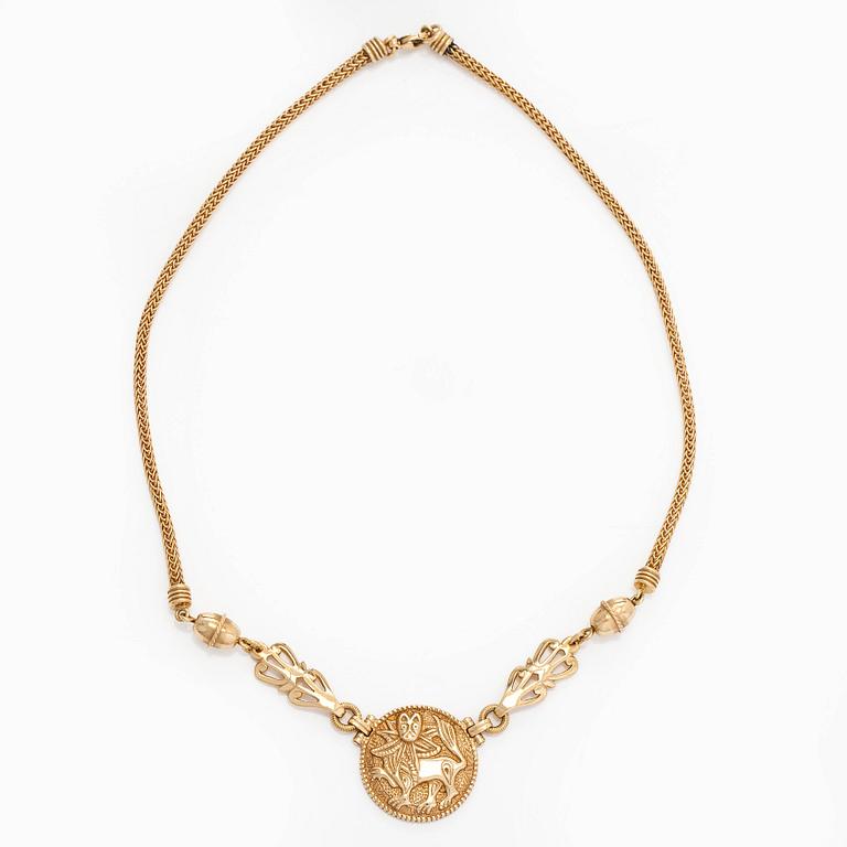 Kalevala Koru, an 18K gold 'Sun Lion* necklace, Helsinki 1997, numbered 137/180.