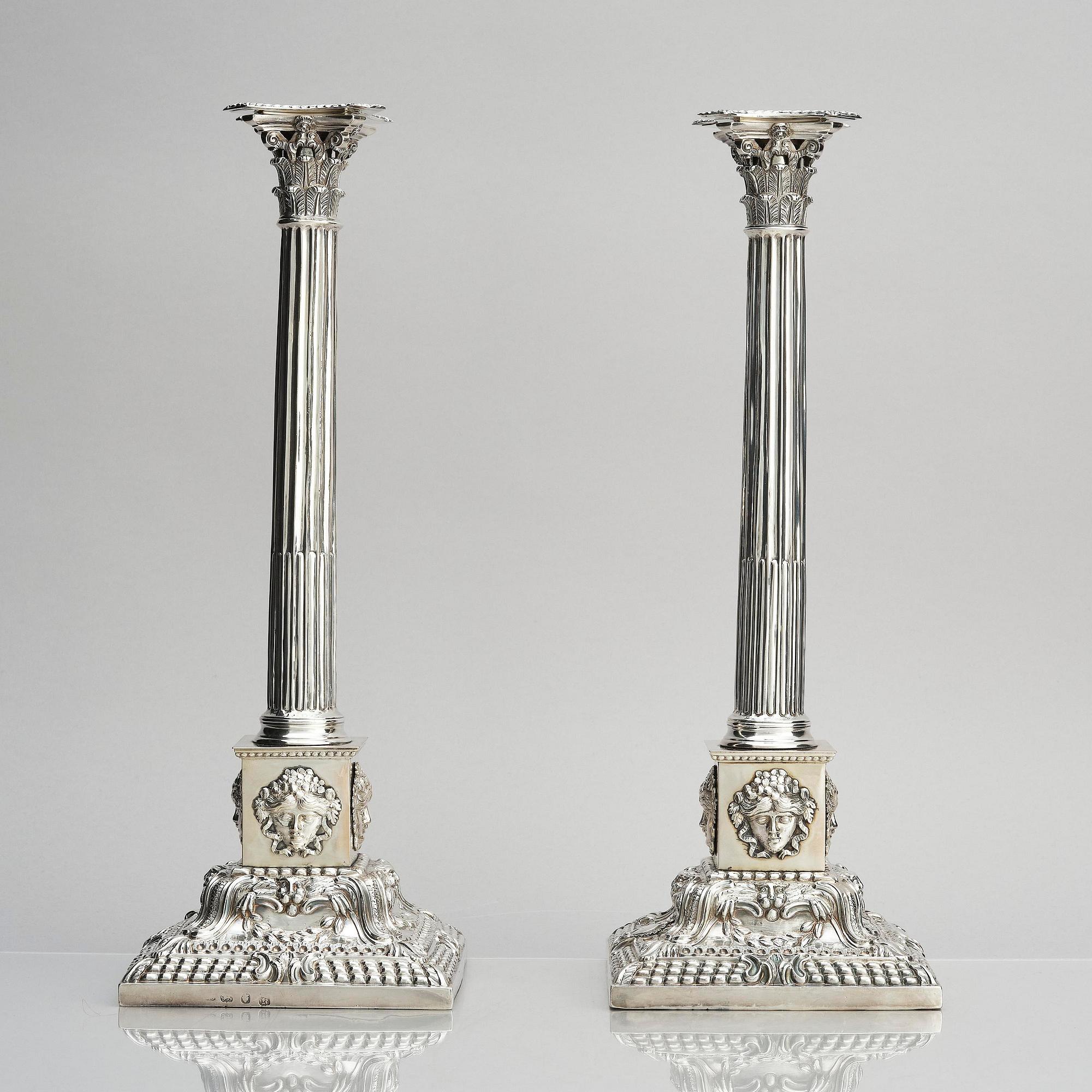 A pair of 18th century silver candlesticks, marks of Ebenezer Coker, London , possibly 1765.