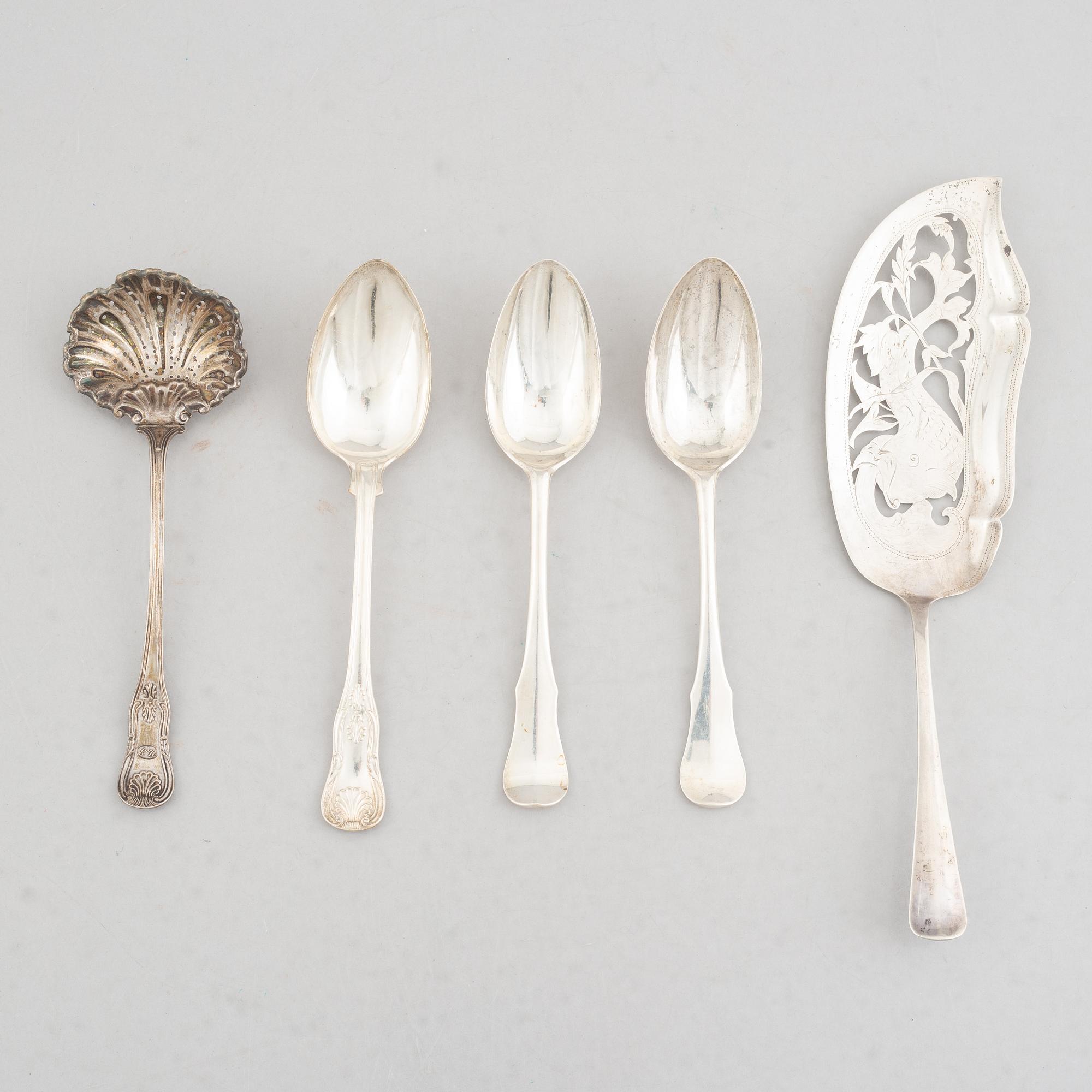 A Set of Silver Spoons and a Server, 18th-20th Century (5 pieces).