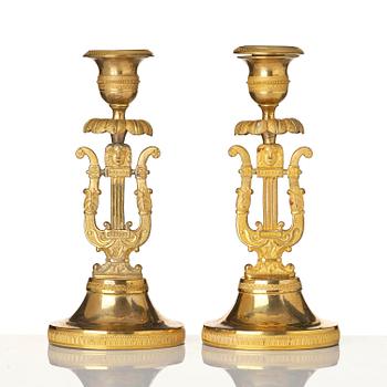 A pair of Swedish Empire ormula candlesticks.
