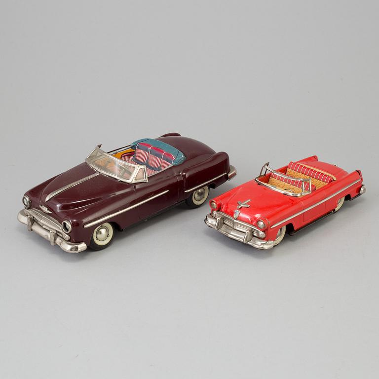 Four toy cars by Tekno and Haji, Germany and Japan.