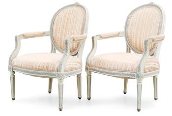 455. A pair of Gustavian late 18th Century armchairs by E. Öhrmark.