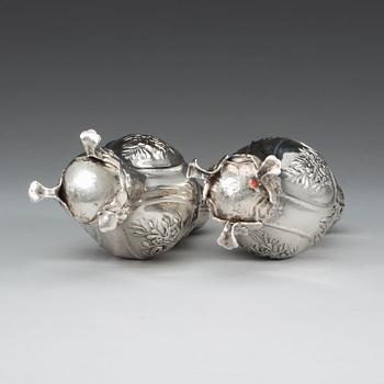 A Swedish 18th century silver sugar-casters, marked Lorentz Lindgren, Borås 1779, and one later copy with false marks.