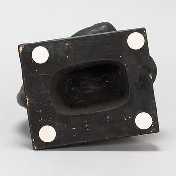 Ivar Johnsson, a painted plaster sculpture, signed.