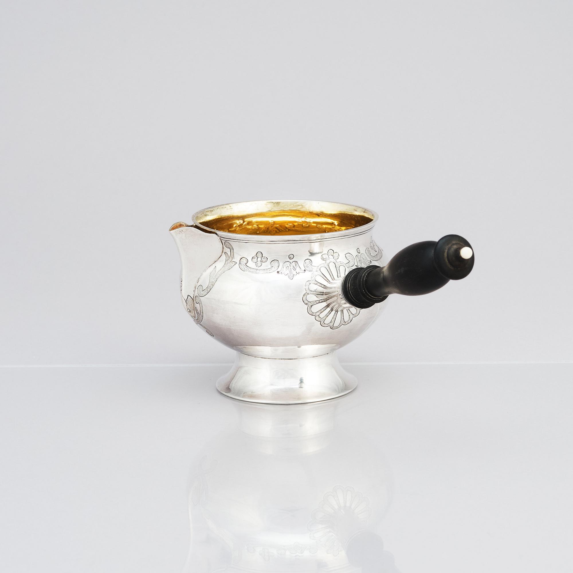 A Danish parcel-gilt silver saucepan, mark of Christian Werum, Copenhagen 1779. Fabricius hallmark.
