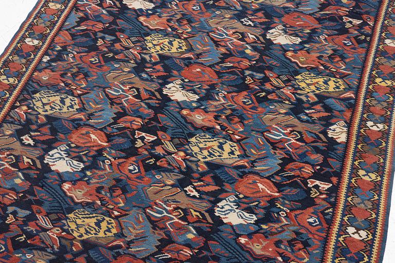 A Kilim rug, Senneh, approx. 199 x 132 cm.