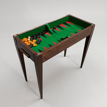 A GAME TABLE, early 19th century.