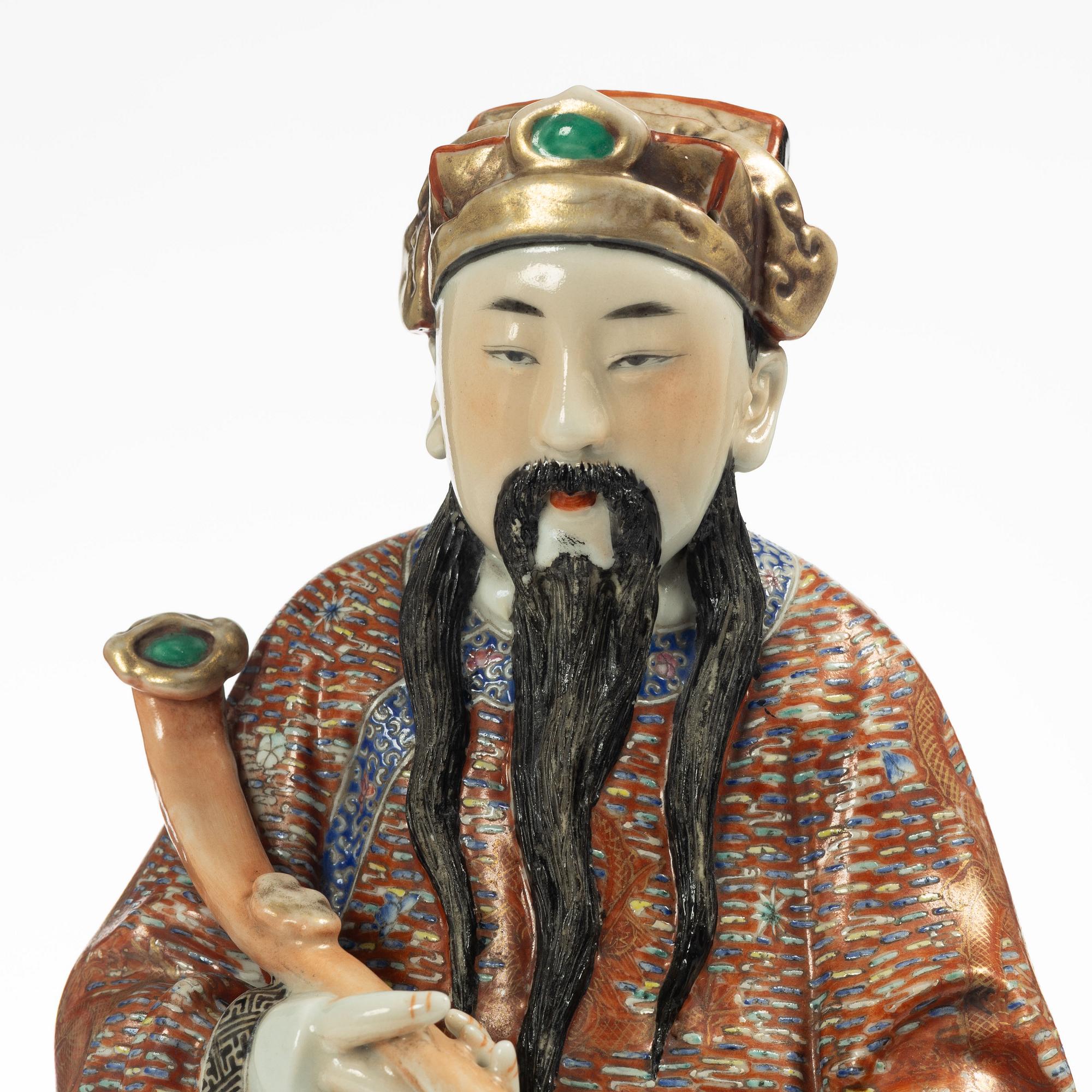 A Chinese porcelain figure, late Qing dynasty / around 1900.