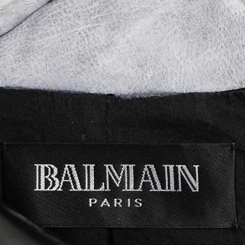 BALMAIN, a black leather jacket with paste.