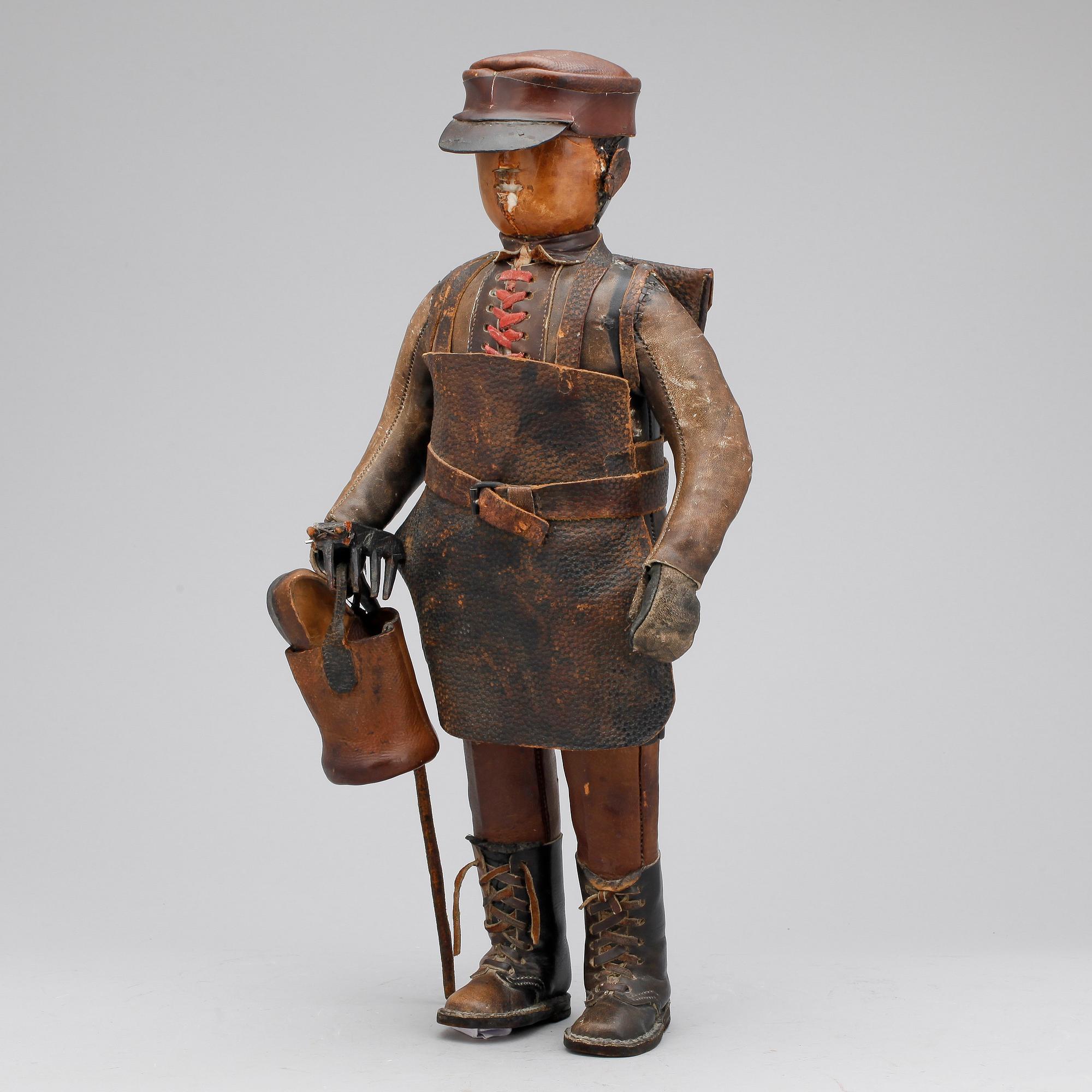 DOCKA, läder, 1800-tal.