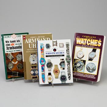 A lot of eleven books and booklets regarding watches.