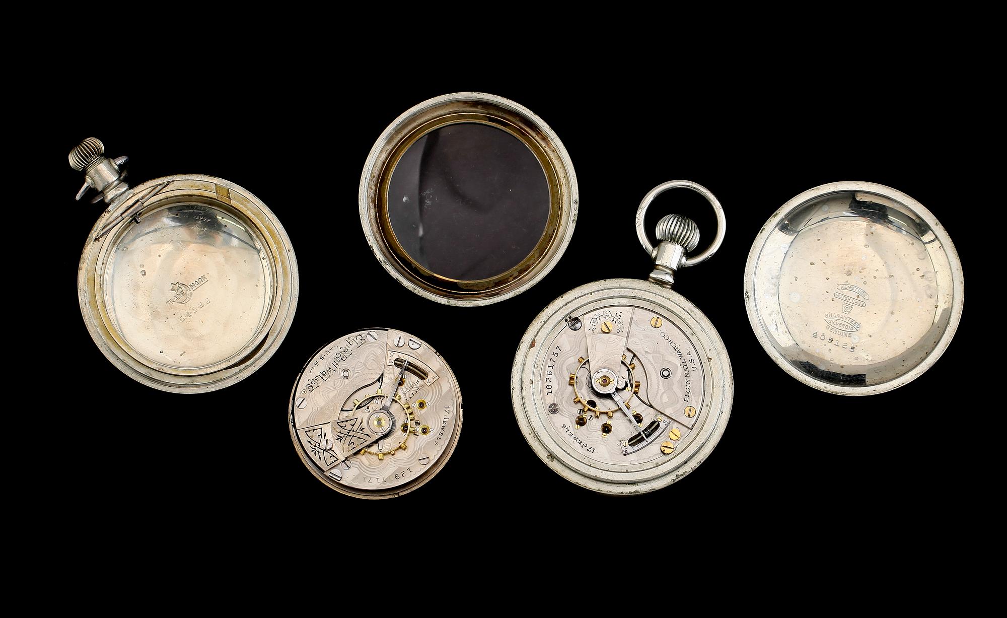 FICKUR, 2 st, nickel, bl a Elgin, omkring år 1900.