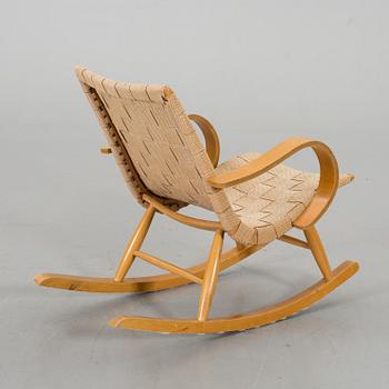 A 1940s possibly Yngve Ekstrom rocking chair.