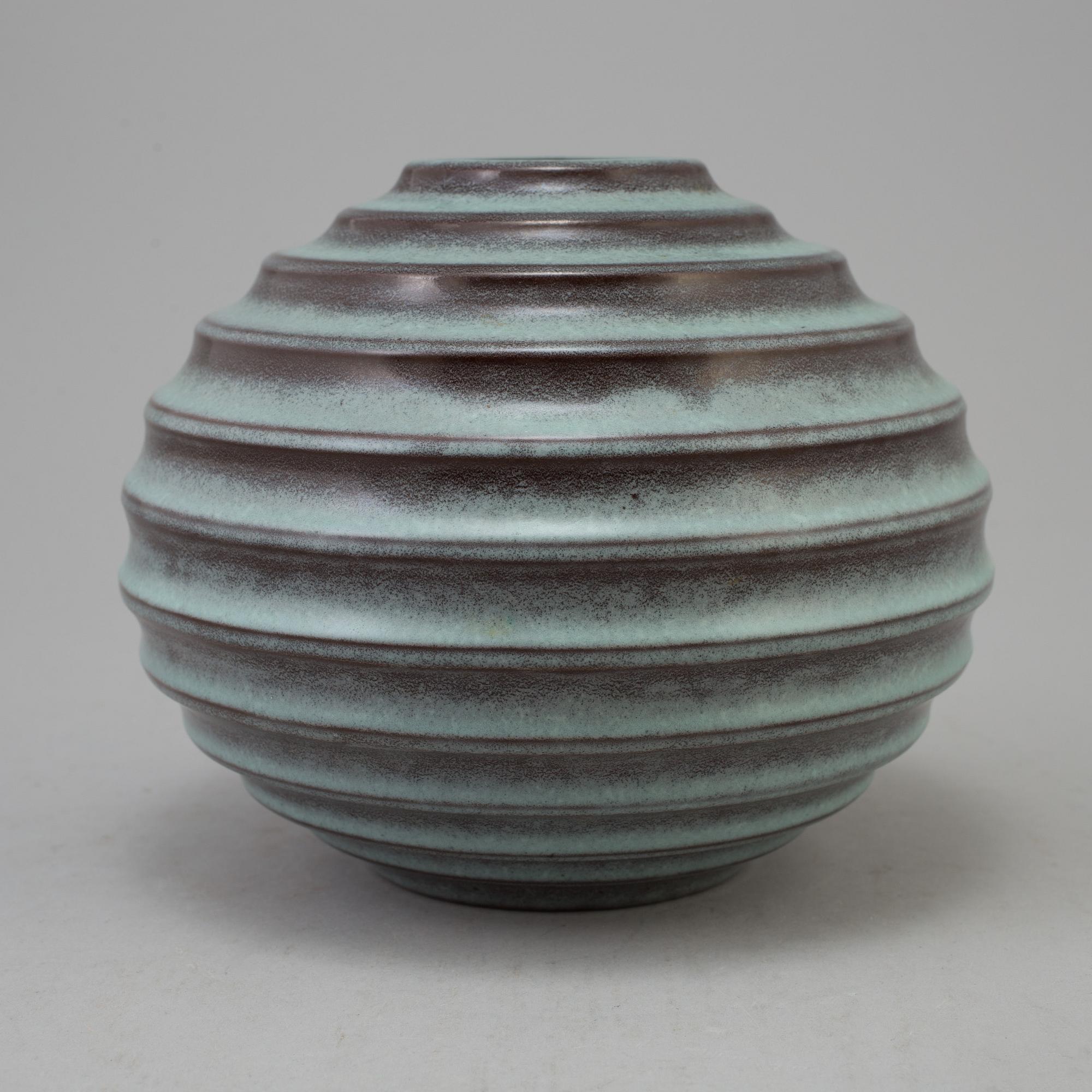 A vase designed by Ewald Dahlskog in 1930. Manufactured by Bo Fajans, Gävle.