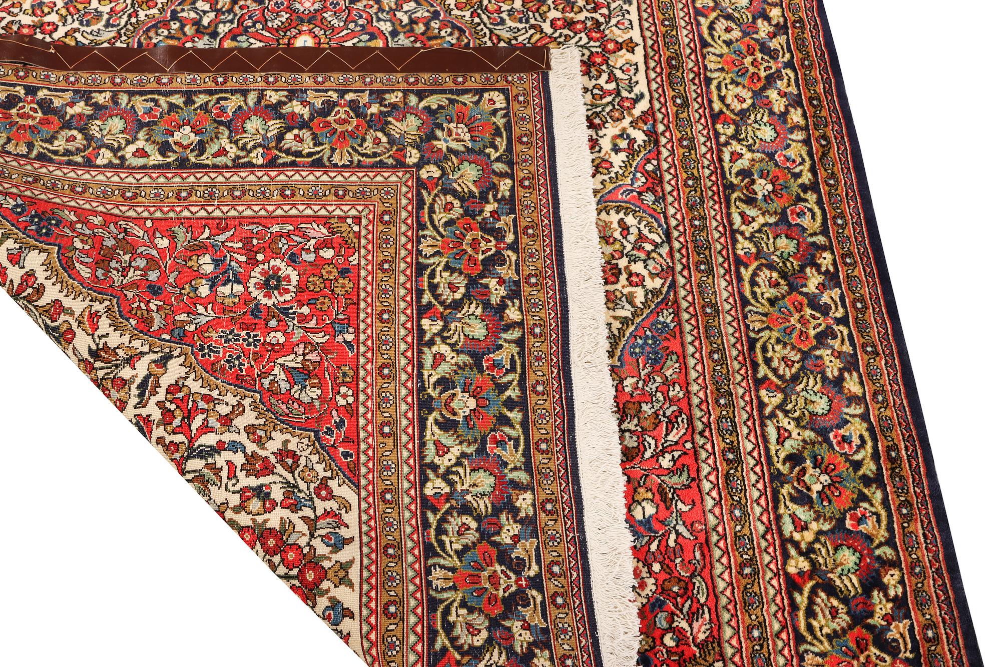 A Ghom rug, c. 202 x 137 cm.