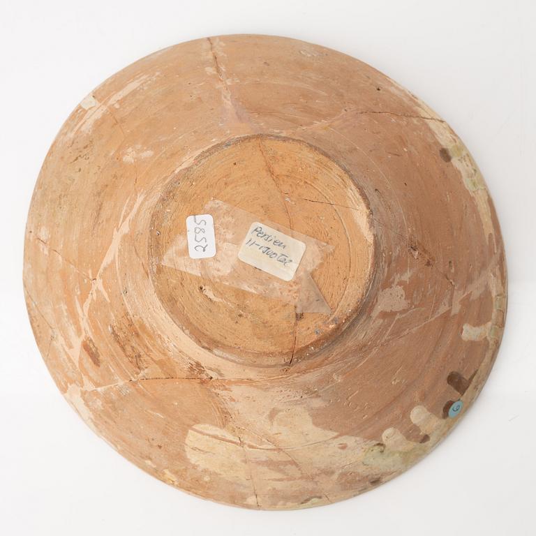 A glazed earthenware bowl, possibly Hispano-Moresque.