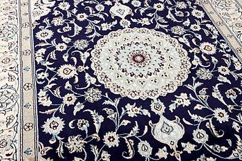 A part silk Nain rug, 9LA, c. 292 x 190 cm.