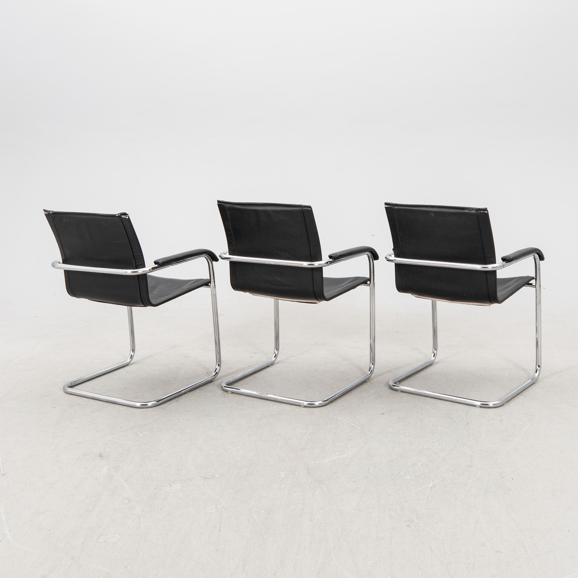 A set of five chrome and leather armchairs alter part of the 20th century.