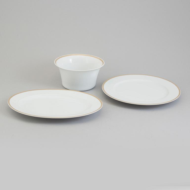 one bowl and two porcelain plates, 'Médaillon Méandre d'Or', Ikarus, by Versace for Rosenthal.