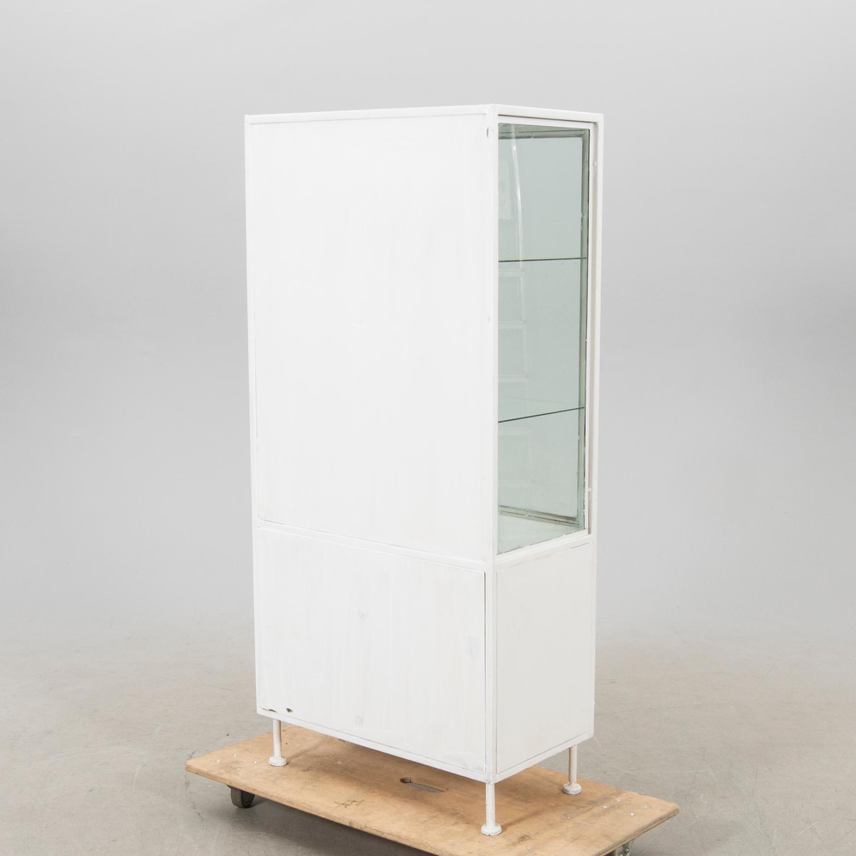 A mid 1900s metal medicine cabinet.