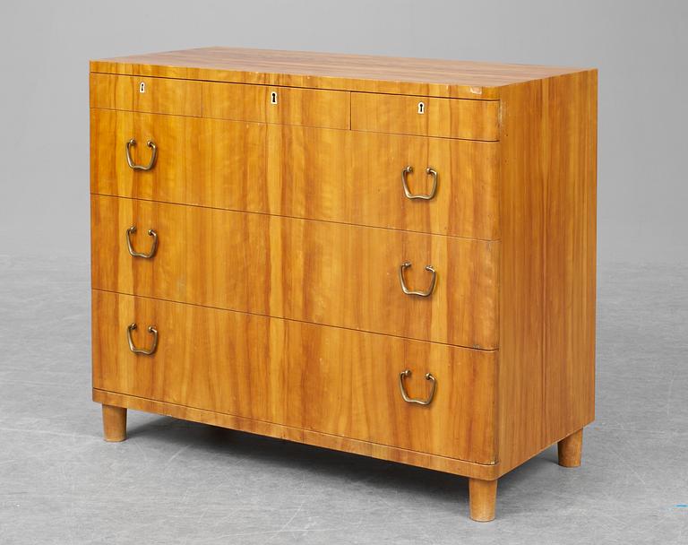 A Carl-Axel Acking elm chest of drawers with brass handles, by Svenska Möbelfabrikerna Bodafors, 1930's.