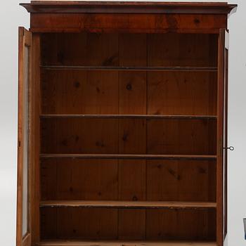 A Swedish Empire Mahogany Cabinet, 19th Century.