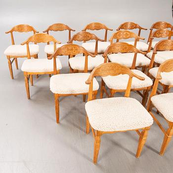 A set of 14 Henning Kjaerulf 1950s oak chairs.