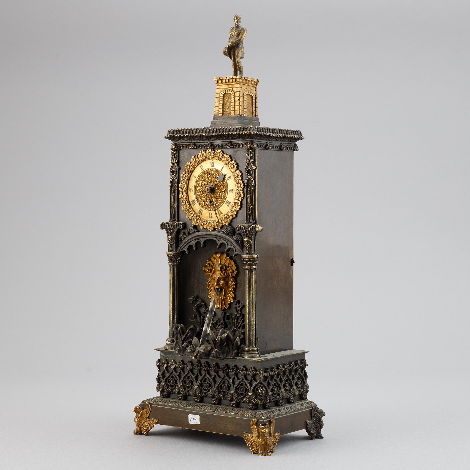 A Neo-Gothic mantel clock, late 19th Century.