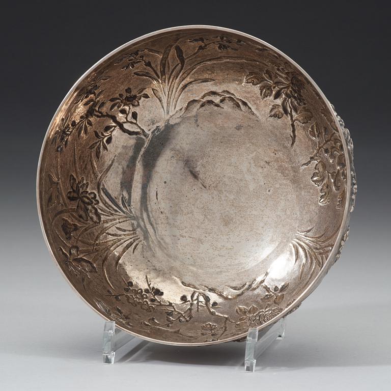 An export silver bowl, Shanghai, bears marks Shanghai Woshing, circa 1910.