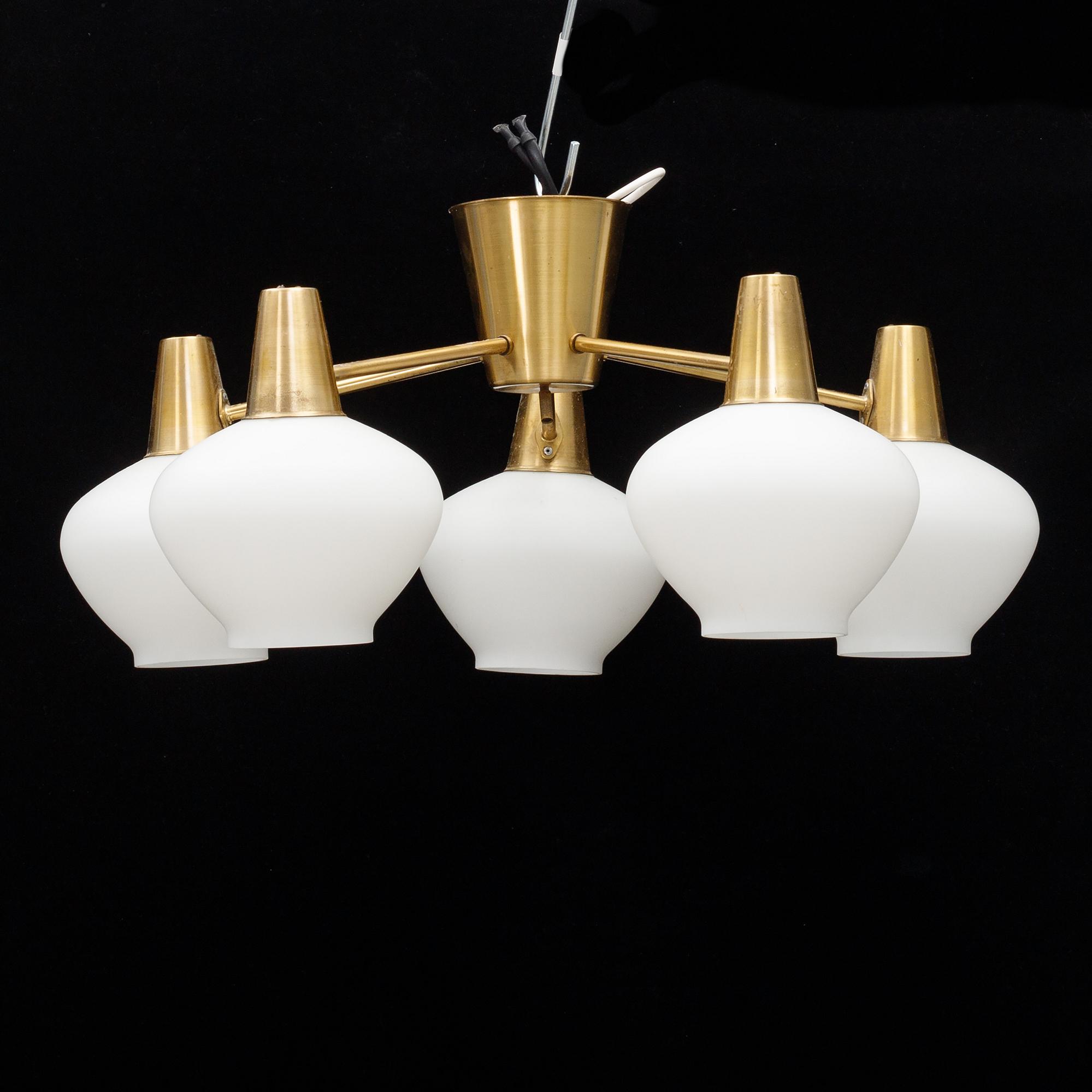 A mid 20th Century brass and glass ceiling light from Asea.