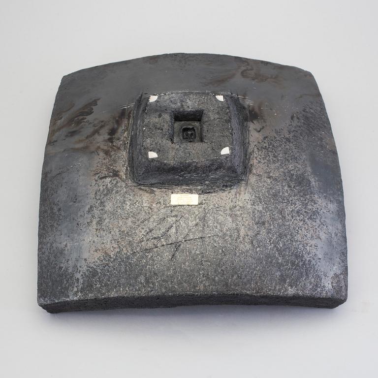 A barrel by LENA SVENSSON, raku burned pottery, sined.
