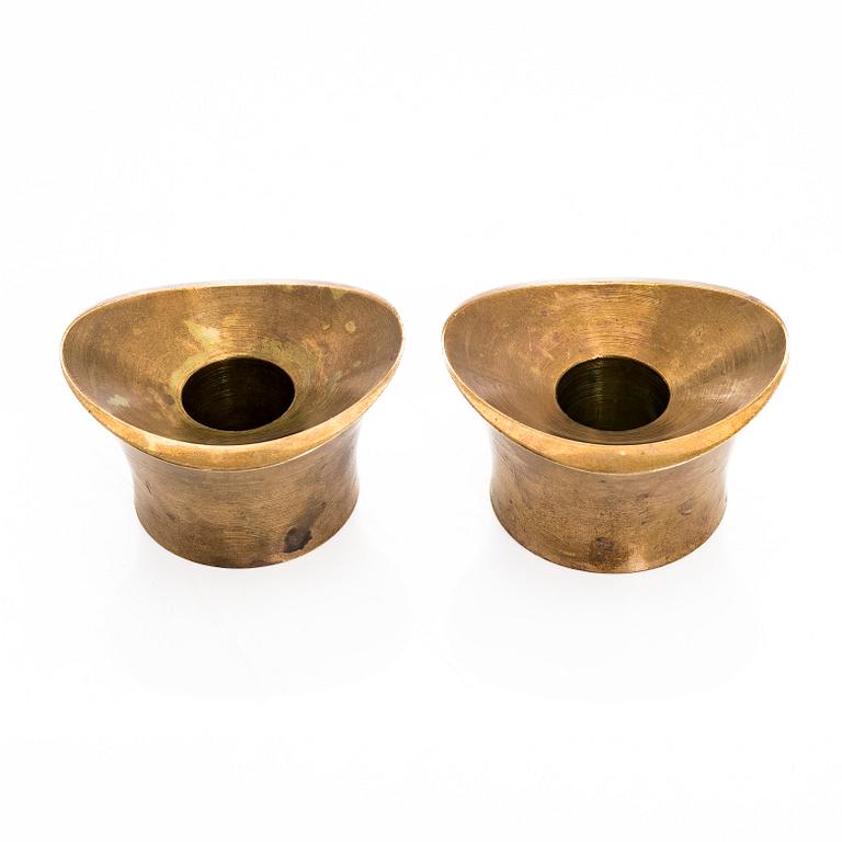 Tapio Wirkkala,  a pair of bronze candle holders for Kultakeskus Oy.