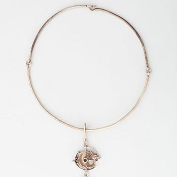 Juhls silver necklace.