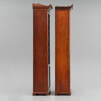 A pair of late Empire mahogany book cabinets, Stockholm, 1820/30's.