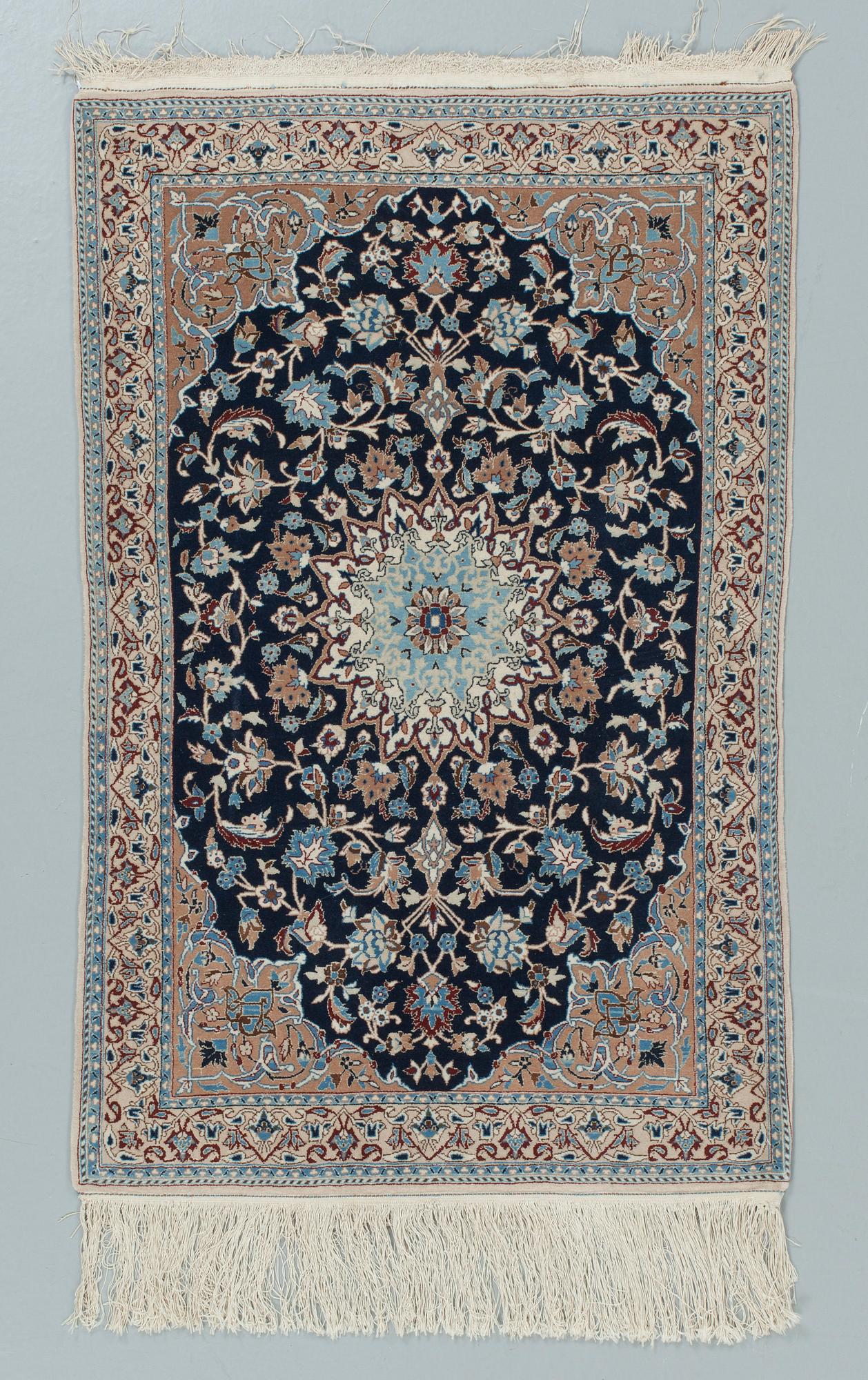 A 6 LAA Nain rug, around  119 x 77 cm.