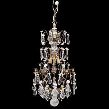 A Rococo style chandelier, mid 20th Century.