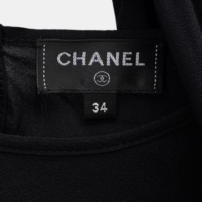 Chanel, A black silk top, size 34.