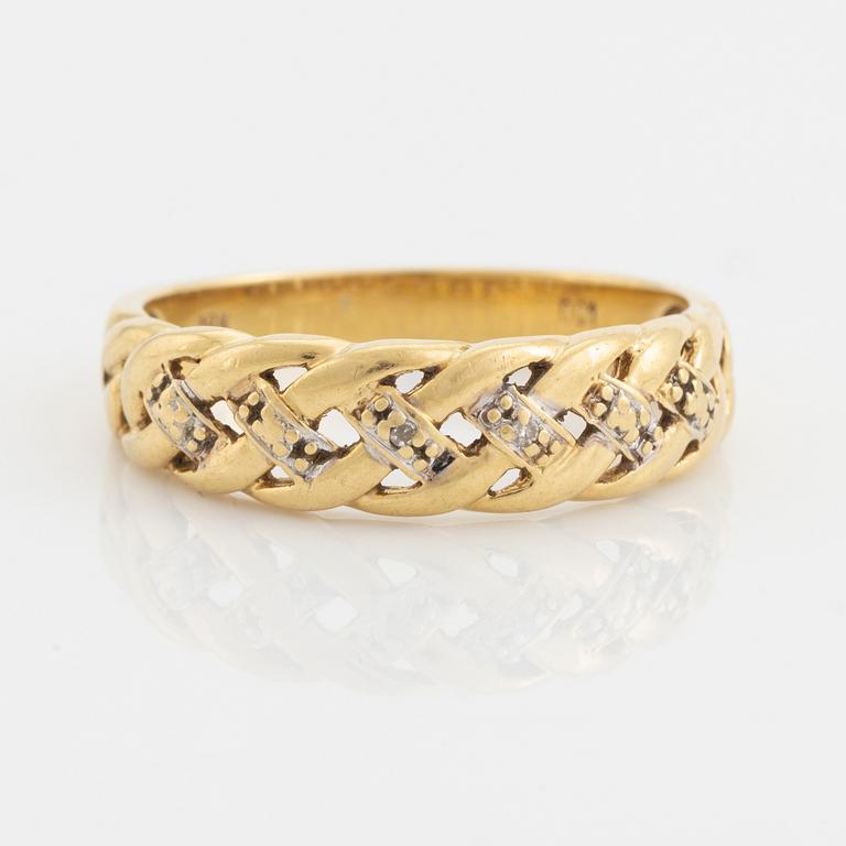 18K gold and small diamond ring.