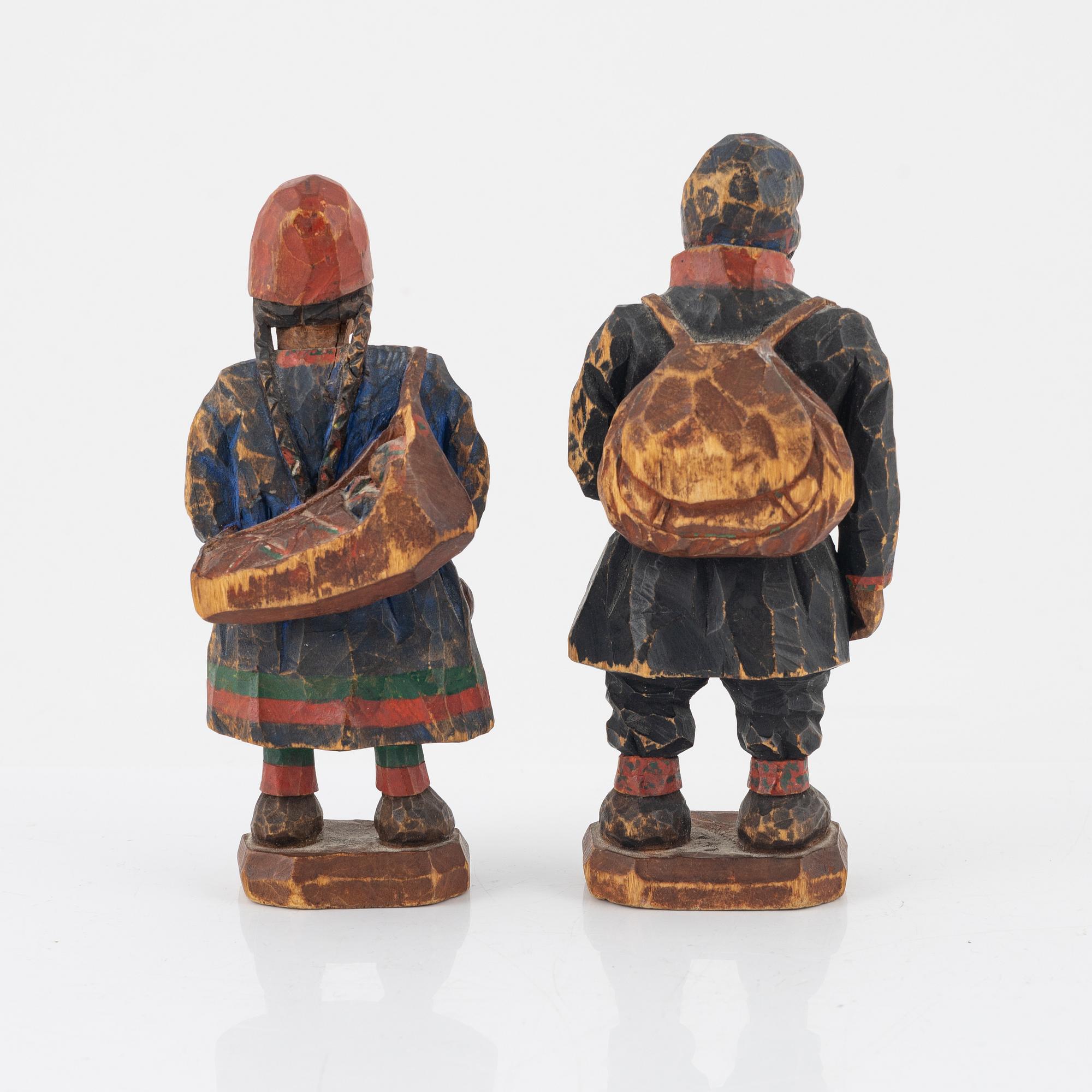 Torborg Lindberg-Karlsson, a pair of figurines, carved and painted wood, signed TL.