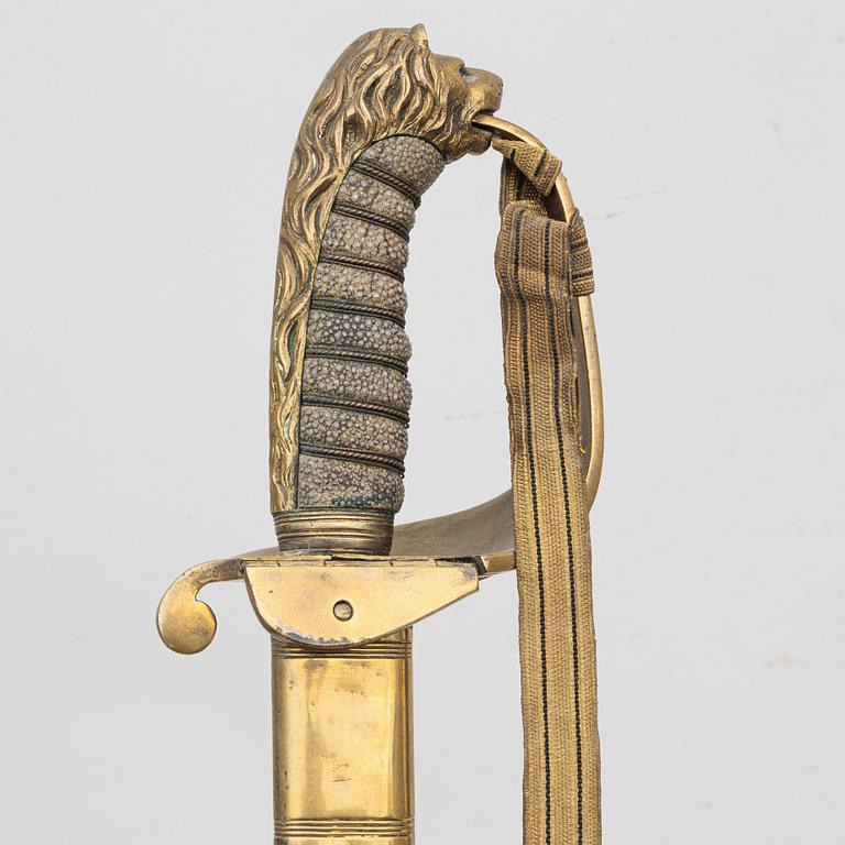 A Britiish Navy officer's sword 1827 pattern with scabbard.