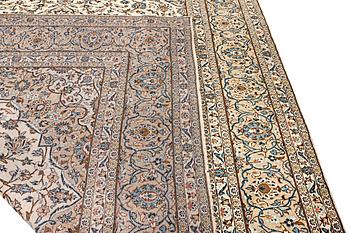 A Keshan carpet, a. 395 x 286 cm.