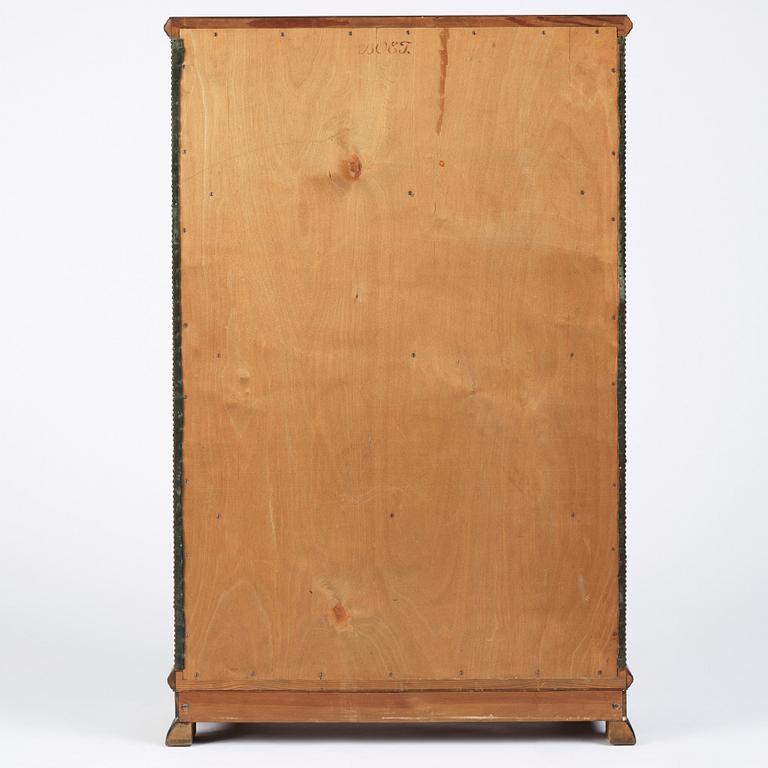 Otto Schulz, a velvet covered Swedish Modern cabinet, Sweden, late 1920s.