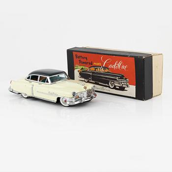 A 'Cadillac' toy car, Marusan Co Ltd, Japan, mid 20th Century.