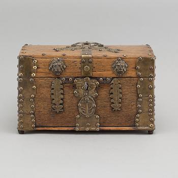 A wooden and brass box, around the turn of the century.