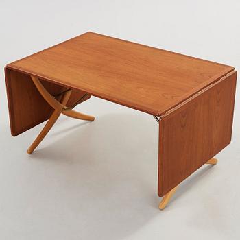 Hans J. Wegner, a teak and beech dining table by Andreas Tuck, Denmark 1950-60's.