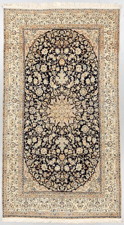 A carpet, Nain, part silk, so called 6 LAA, ca 280 x 157 cm.