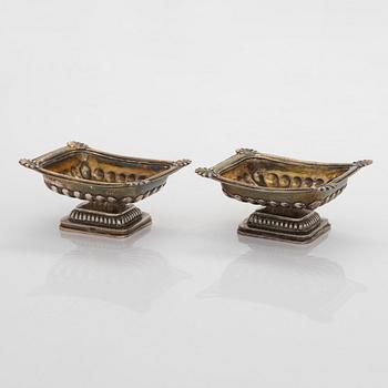 Two pairs of parcel-gilt salt cellars, latter half of the 19th century.